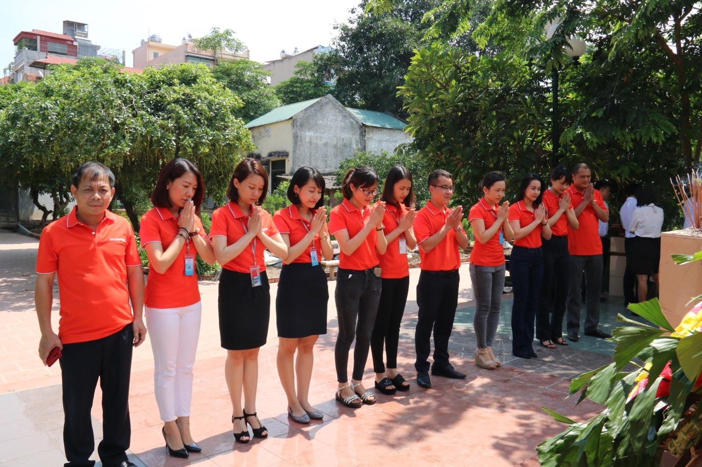 TASECO Youth Union members hold a ceremony at the Memorial
