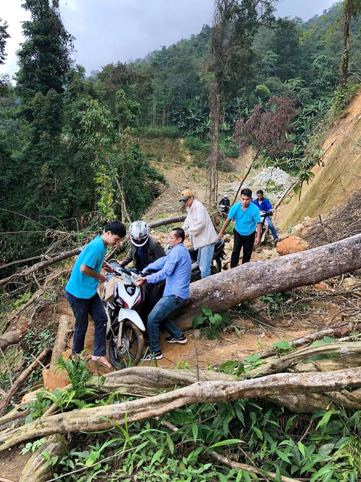 There are sections of the road where the group has to take turns carrying the bike over obstacles.
